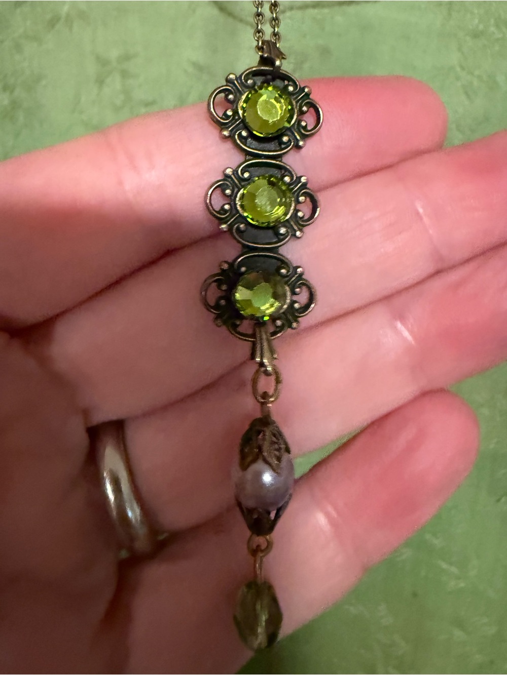 Anthropologie green and antique gold pendant necklace